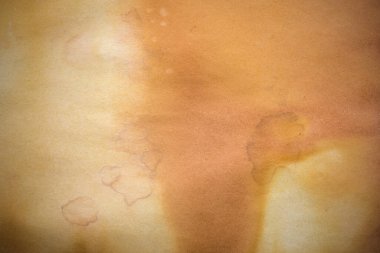 Aged paper sheet. Blank old background with dust and dirty stains. Vintage and antique art concept. Poster mockup. Detailed closeup studio shot. Front view. Toned