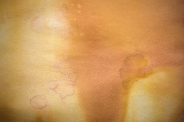 Aged paper sheet. Blank old background with dust and dirty stains. Vintage and antique art concept. Poster mockup. Detailed closeup studio shot. Front view. Toned