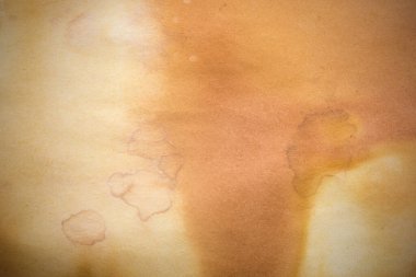 Aged paper sheet. Blank old background with dust and dirty stains. Vintage and antique art concept. Poster mockup. Detailed closeup studio shot. Front view. Toned