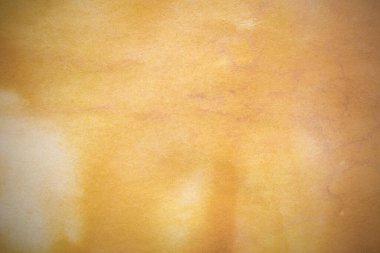 Aged paper sheet. Blank old background with dust and dirty stains. Vintage and antique art concept. Poster mockup. Detailed closeup studio shot. Front view. Toned