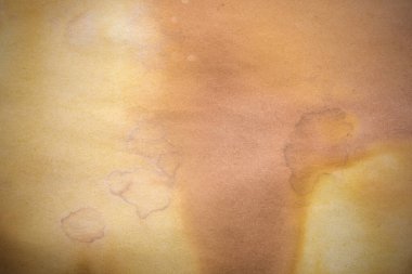 Aged paper sheet. Blank old background with dust and dirty stains. Vintage and antique art concept. Poster mockup. Detailed closeup studio shot. Front view. Toned