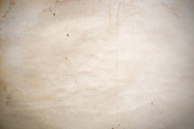 Aged paper sheet. Blank old background with dust and dirty stains. Vintage and antique art concept. Poster mockup. Detailed closeup studio shot. Front view. Toned