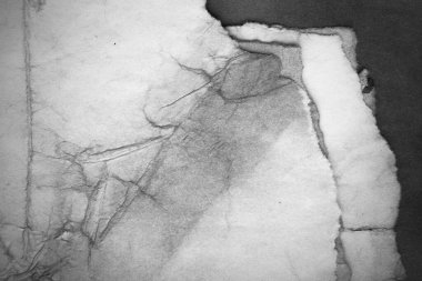 Eski kağıt çarşaf. Toz ve kirli lekelerle dolu boş bir arka plan. Eski ve antika sanat konsepti. Ayrıntılı yakın çekim stüdyo çekimi. Ön manzara. Ayarlanmış