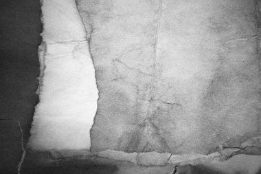 Eski kağıt çarşaf. Toz ve kirli lekelerle dolu boş bir arka plan. Eski ve antika sanat konsepti. Ayrıntılı yakın çekim stüdyo çekimi. Ön manzara. Ayarlanmış