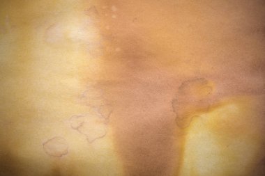 Aged paper sheet. Blank old background with dust and dirty stains. Vintage and antique art concept. Poster mockup. Detailed closeup studio shot. Front view. Toned