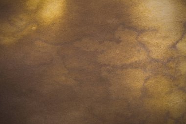 Aged paper sheet. Blank old background with dust and dirty stains. Vintage and antique art concept. Poster mockup. Detailed closeup studio shot. Front view. Toned