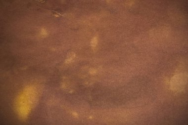 Aged paper sheet. Blank old background with dust and dirty stains. Vintage and antique art concept. Poster mockup. Detailed closeup studio shot. Front view. Toned