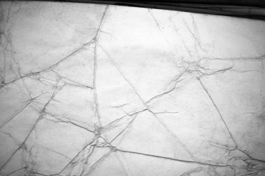 Eski kağıt çarşaf. Toz ve kirli lekelerle dolu boş bir arka plan. Eski ve antika sanat konsepti. Ayrıntılı yakın çekim stüdyo çekimi. Ön manzara. Ayarlanmış