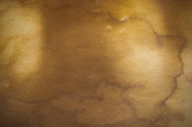 Aged paper sheet. Blank old background with dust and dirty stains. Vintage and antique art concept. Poster mockup. Detailed closeup studio shot. Front view. Toned