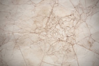 Aged paper sheet. Blank old background with dust and dirty stains. Vintage and antique art concept. Poster mockup. Detailed closeup studio shot. Front view. Toned