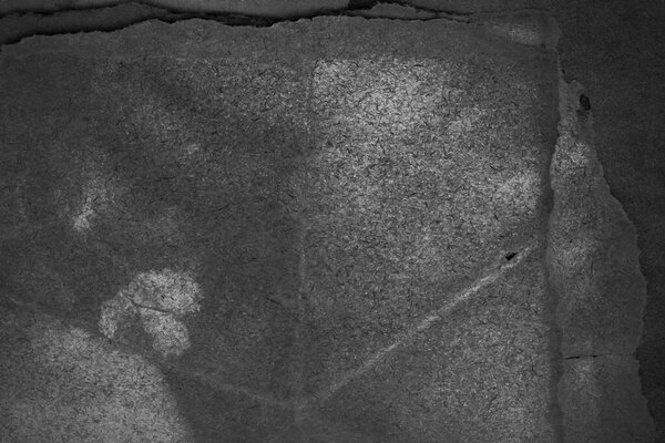 Стареющий лист бумаги. Пустой старый фон с пылью и грязными пятнами. Винтажное и антикварное искусство. Подробная съемка студии крупным планом. Вид спереди. Toned
