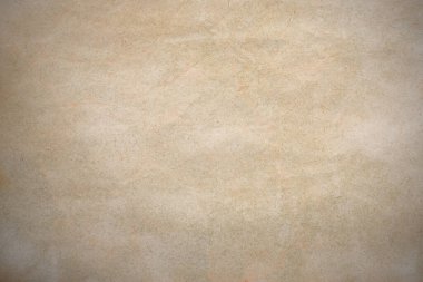 Aged paper sheet. Blank old background with dust and dirty stains. Vintage and antique art concept. Poster mockup. Detailed closeup studio shot. Front view. Toned