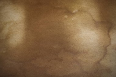 Aged paper sheet. Blank old background with dust and dirty stains. Vintage and antique art concept. Poster mockup. Detailed closeup studio shot. Front view. Toned