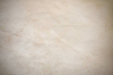 Aged paper sheet. Blank old background with dust and dirty stains. Vintage and antique art concept. Poster mockup. Detailed closeup studio shot. Front view. Toned