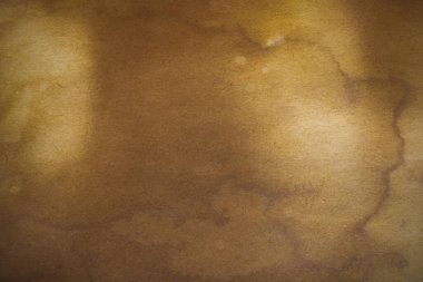 Aged paper sheet. Blank old background with dust and dirty stains. Vintage and antique art concept. Poster mockup. Detailed closeup studio shot. Front view. Toned