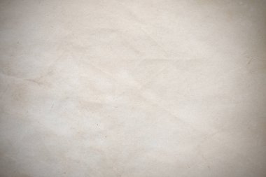 Aged paper sheet. Blank old background with dust and dirty stains. Vintage and antique art concept. Poster mockup. Detailed closeup studio shot. Front view. Toned