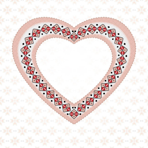 Розовое вышитое сердце на светлом фоне
