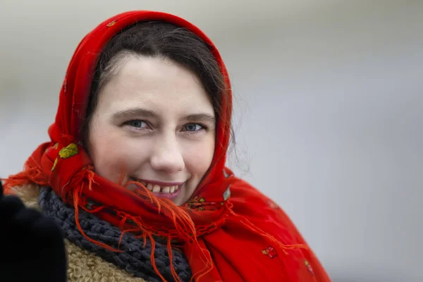 Belarus, Gomel, January 13, 2017. Portrait of a woman in a Russian scarf. Russian woman