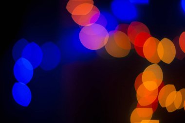 Büyük noktalar ile bulanık bokeh mavi yeşil turuncu