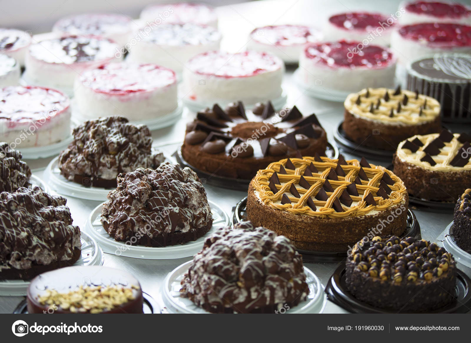 Many Cakes Table Industrial Cake Line \u2014 Stock Photo © aspsvz