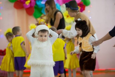 Belarus, the city of Gomel on March 2, 2018. Kindergarten for children. Little child on holiday clipart