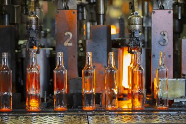 Glassworks. Glass industry. The process of making glass bottles. clipart