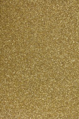 Altın parıltılı kumaş. Arkaplan için yaldızlı kağıt.