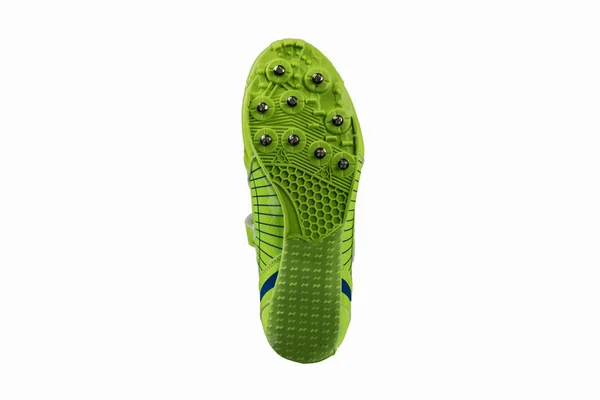 绿色鞋底 白色背景上有刺的运动鞋 运动鞋 — 图库照片