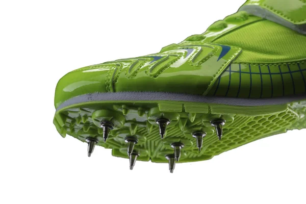 Фрагмент Зеленого Глянцевого Кросівки Шипами Білому Тлі Спортивне Взуття — стокове фото