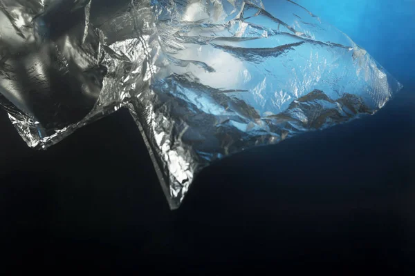Cellophane bag in the water. Oceans pollution concept