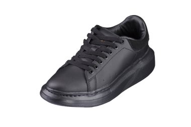 Spor ayakkabılar. Beyaz arka planda siyah bir spor ayakkabı. Ayakkabı..