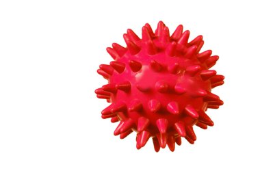 Red rubber ball with spikes on a white background. clipart