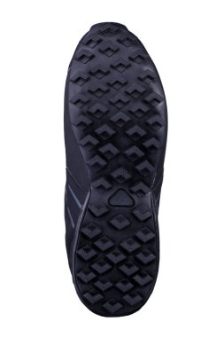 Beyaz arka planda siyah flütlü ayakkabı tabanı.