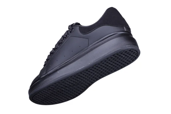 一只白色背景的黑色运动鞋 运动鞋 — 图库照片