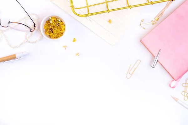 Notebook, glasses and golden accessories — Stock Photo, Image