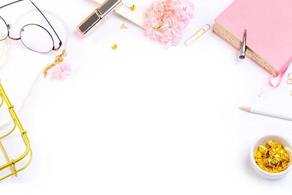 Notebook, glasses and golden accessories — Stock Photo, Image