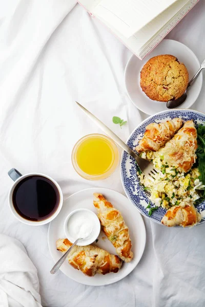 stock image Scrambled eggs with cheese croissants 