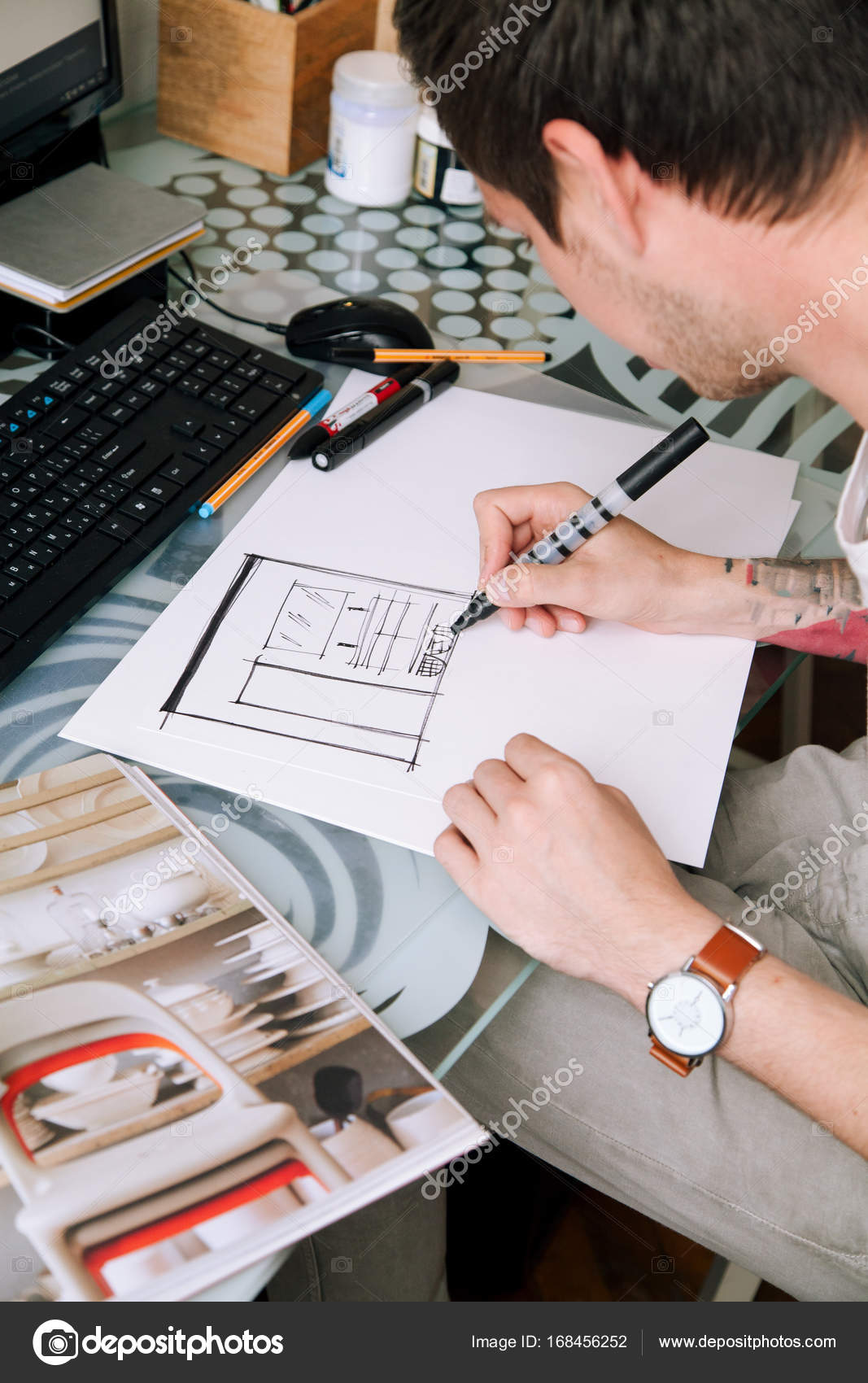 designer making sketch of interior project with black marker nice tattoo on his arm natural daylight photo by asinskki - Freelance Interior Design Work designer making sketch of interior project with black marker nice tattoo on his arm natural daylight photo by asinskki - Freelance Interior Design Work
