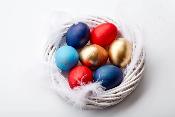 Colorful Painted Eggs Arranged Feathers Twig Wreath White Background Easter — Stock Photo, Image