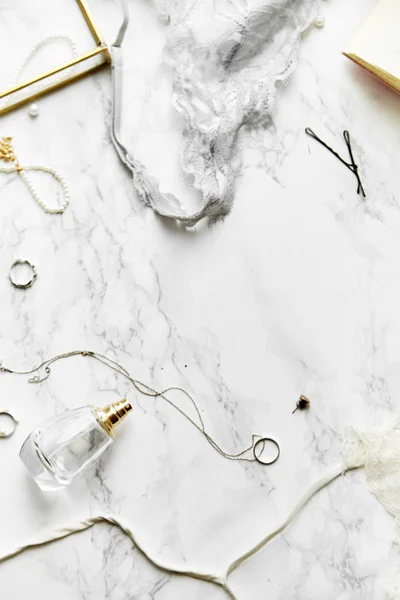 Female Lace Lingerie Perfume Jewelry Items White Marble Background Beauty — Stock Photo, Image