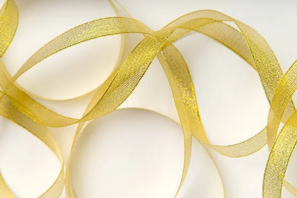 Shiny Golden Ribbon Wound Spirals White Background — Stock Photo, Image