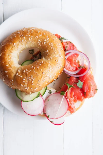 Bagel Salmon Fish Cream Cheese Cucumber Fresh Radish Slices White — Stock Photo, Image