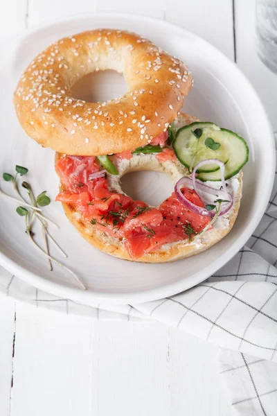 Bagel Salmon Fish Cream Cheese Cucumber Fresh Radish Slices White — Stock Photo, Image