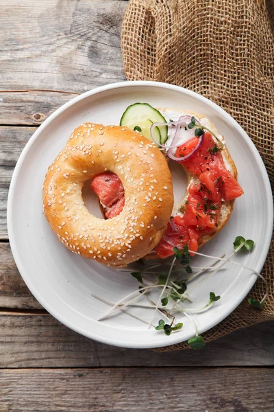 Bagel Salmon Fish Cream Cheese Cucumber Fresh Radish Slices White — Stock Photo, Image