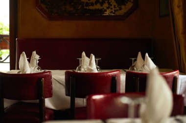 Traditional restaurant interior with table set in Paris 
