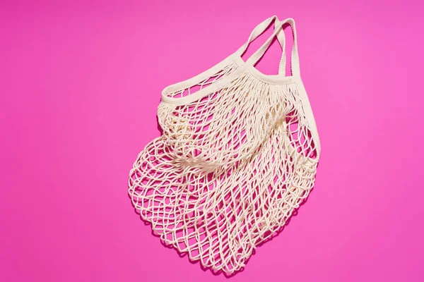 Textilnetztasche Auf Leuchtend Rosa Hintergrund Kunststofffreies Konzept — Stockfoto