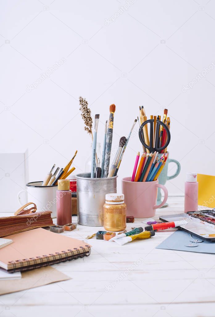 Workspace of designer illustrator with materials and equipment, Freelance creative concept  