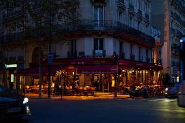 PARIS, FRANCE - NOVEMBER 7, 2019: french restaurant terrace at nighttime                            