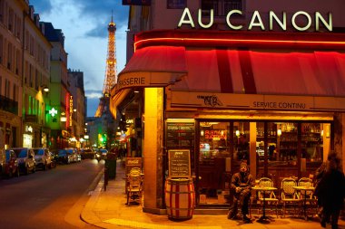 PARIS, FRANCE - NOVEMBER 7, 2019: french restaurant terrace at nighttime                            