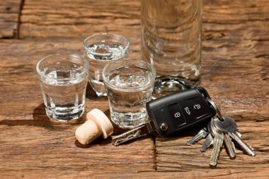 Shot glasses with car key clipart